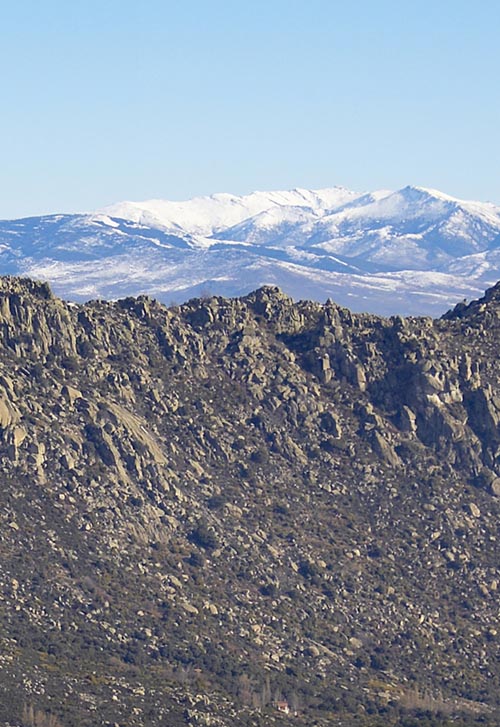 Stone peaks, snowy summits